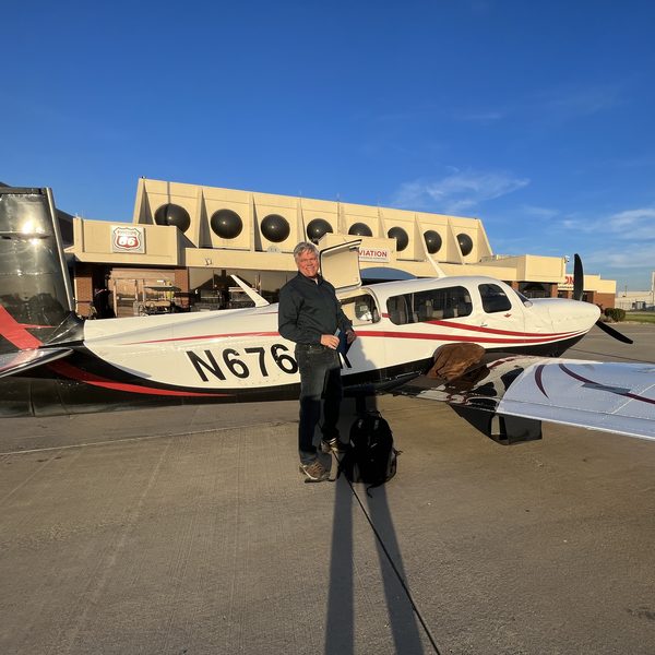 Dan Eldridge with airplane (optional testimonial photo)